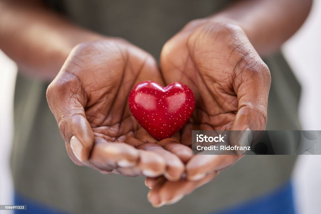 Blog Posts A picture of hands holding a red heart